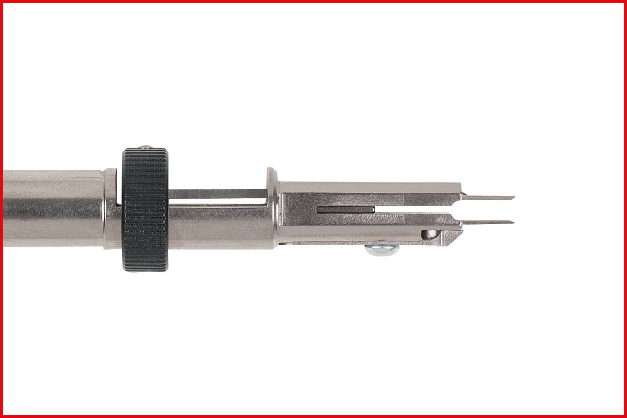 A metal tool with a cylindrical handle and two protruding points at its tip, which enables precise working.