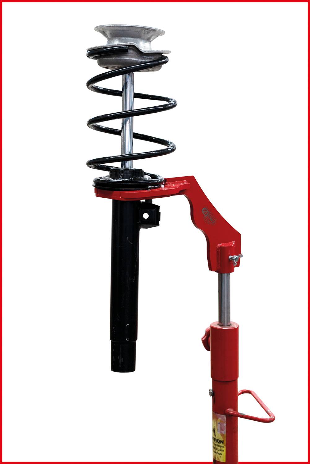 'Red shock absorber with black spiral spring, mounted on a vertical metal stand against a white background.'