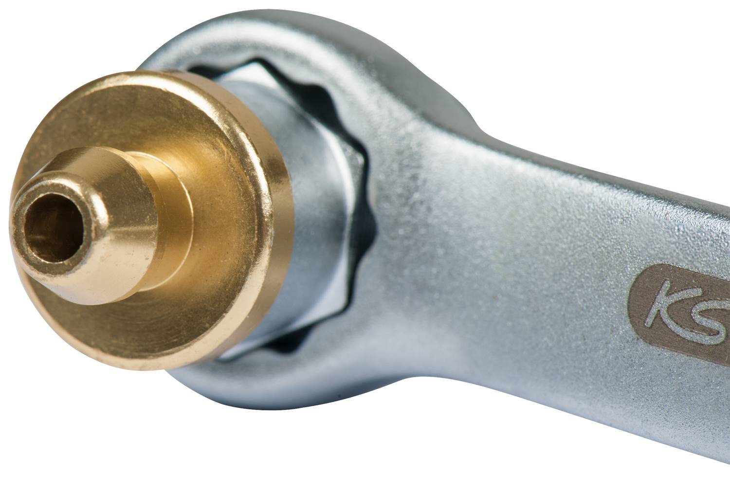 An adjustable spanner with a gold-coloured collar at the opening, used for securing nuts or bolts.