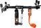 A motor bridge jack with a black frame, multiple adjustment knobs and an orange strap, suitable for engine maintenance.