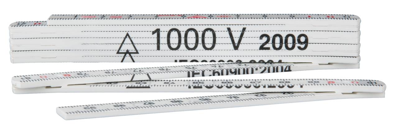 A folded ruler with the inscription '1000 V 2009' is lying on a white background.