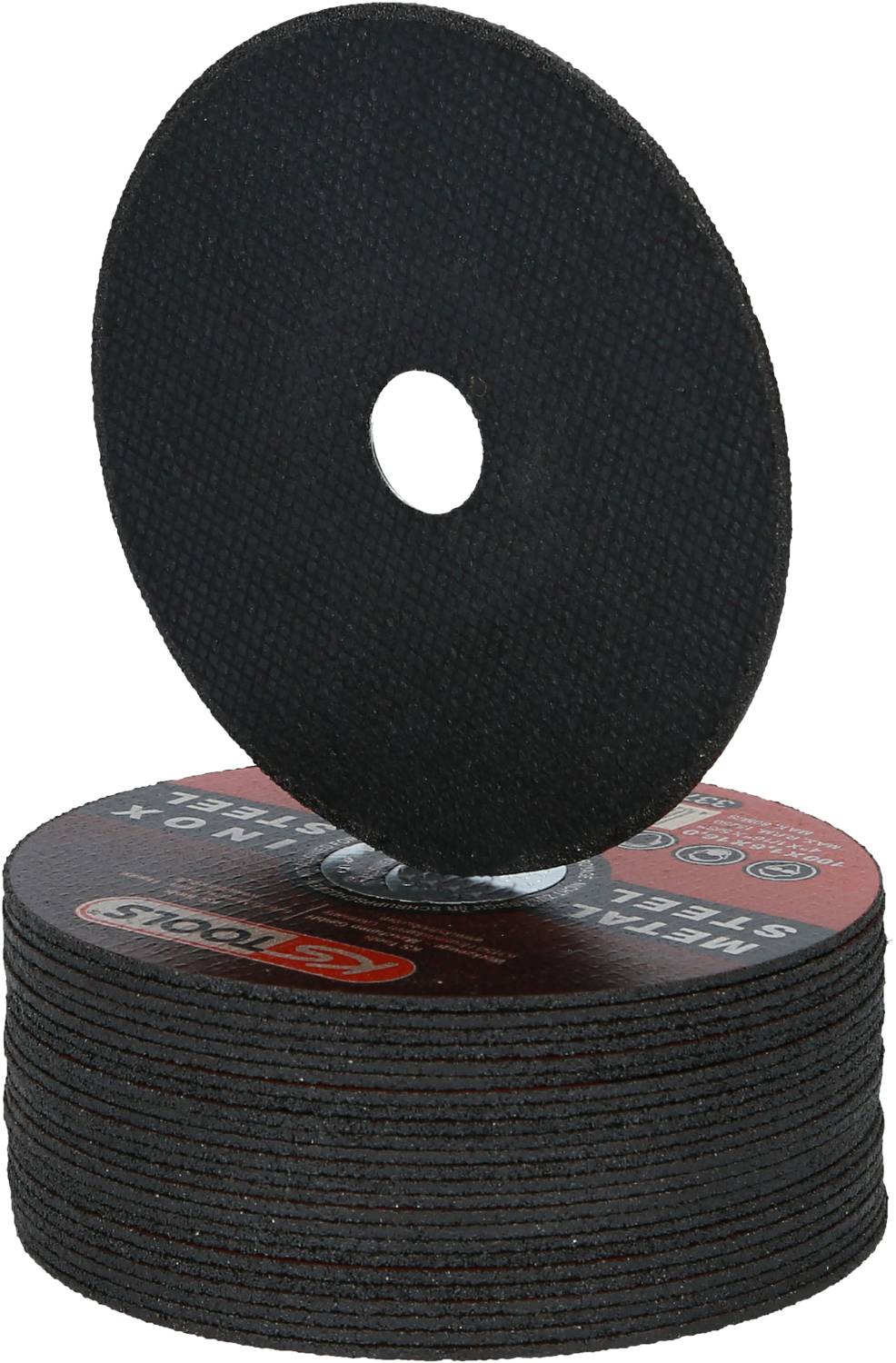 A stack of black grinding discs with a single disc standing upright. The discs are circular and have a central hole.