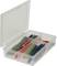 Open plastic box with multiple coloured wax crayons in separate compartments, on a white background.