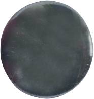 A smooth, dark, round disc made of unidentifiable material, possibly a stone or an object with a mirrored surface.