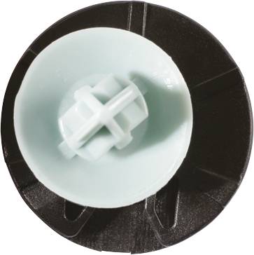 A white plastic disc with a complex internal pattern is centred on a black, round background.