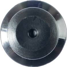 A round, metallic disc with a central black area and a smaller indentation in the centre.