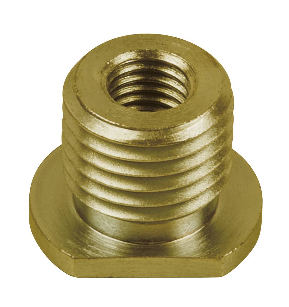 A gold-coloured metal thread with a flat base, likely an adapter socket or cap, is lying on a white surface.