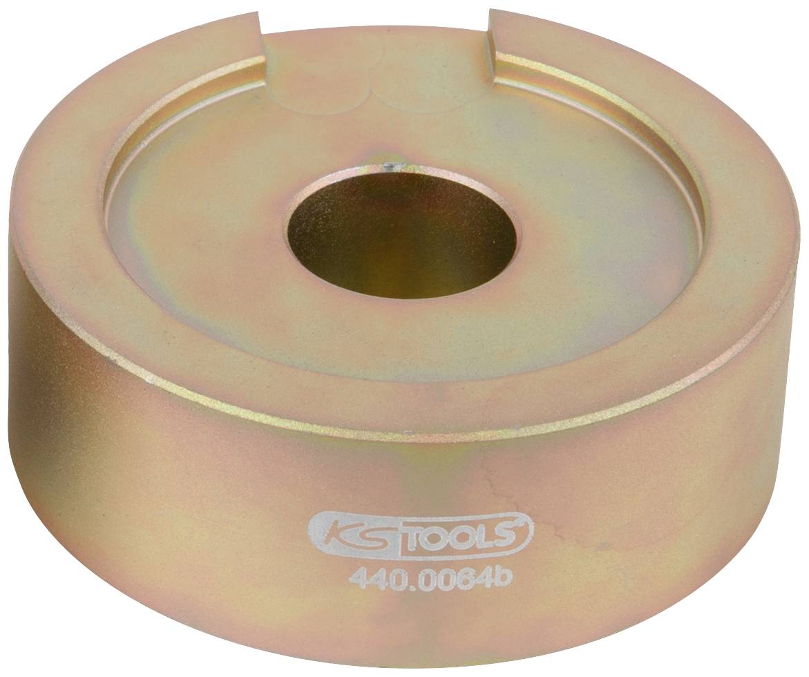 A round, metallic tool component with a central hole and a recess on the top surface. Inscription: 'KS Tools 440.0064b'.