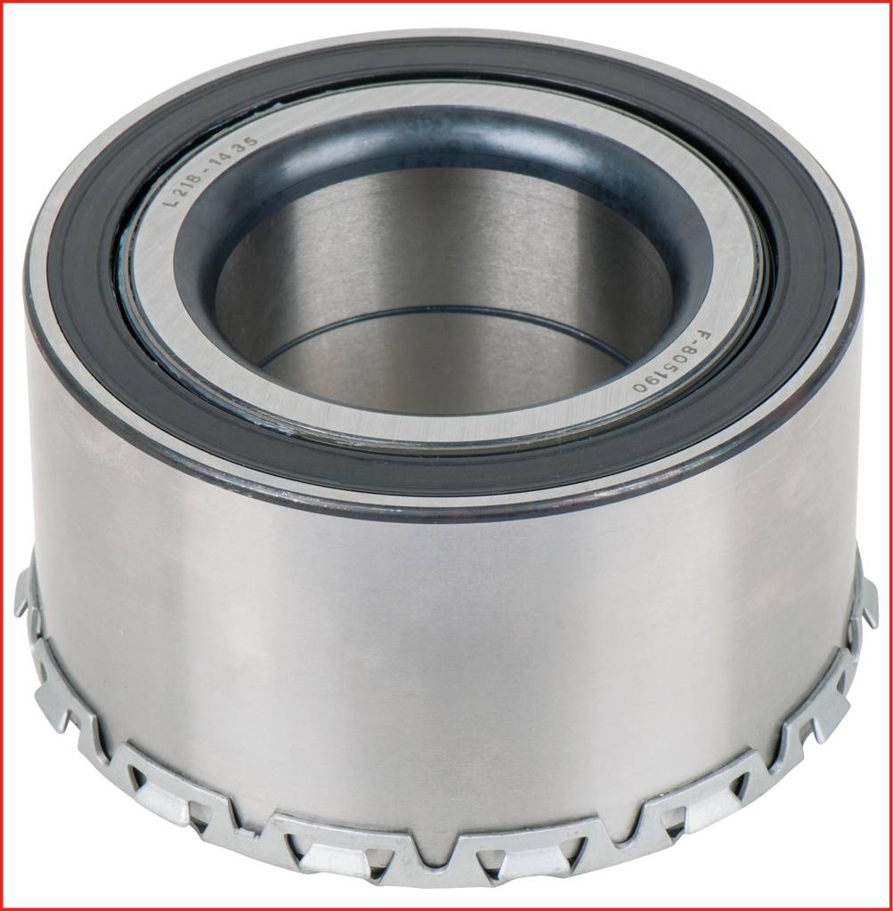 Roller bearing with metal and rubber components, cylindrical in shape with a serrated edge, a typical component in mechanical engineering and the automotive industry.