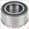 Roller bearing with metal and rubber components, cylindrical in shape with a serrated edge, a typical component in mechanical engineering and the automotive industry.