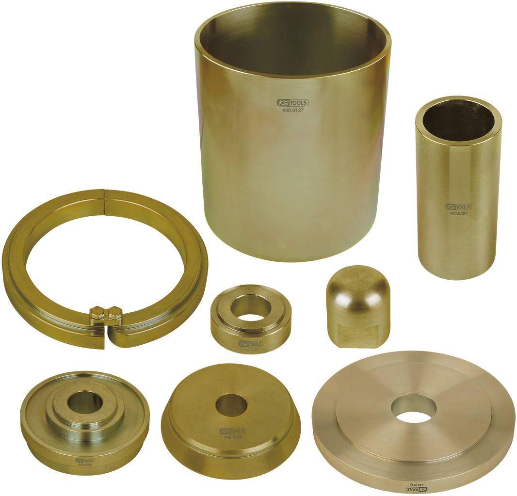 Several cylindrical metal parts in various shapes and sizes, used for mechanical engineering applications, on a white background.