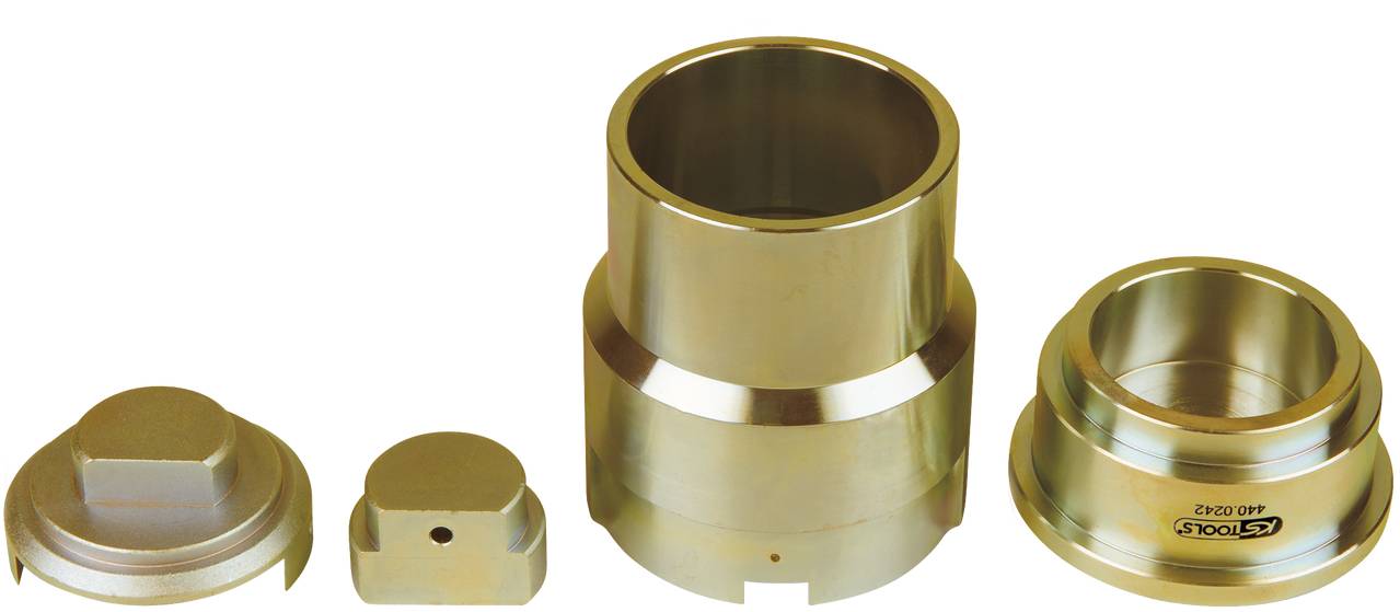 Four metallic tool parts positioned side by side on a white background. Different sizes and shapes, suitable for industrial applications.