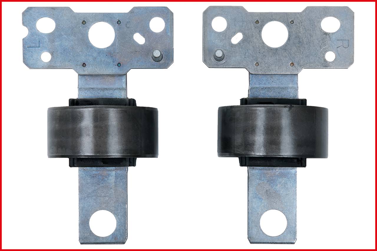 Two identical metal brackets, each with a central wheel bearing. They are positioned side by side.