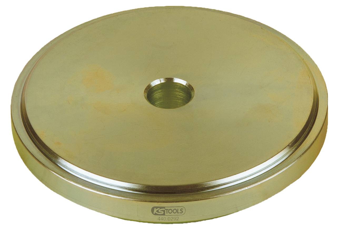 A round, flat metal disc with a central hole and a recognisable manufacturer's name, likely a tool attachment.