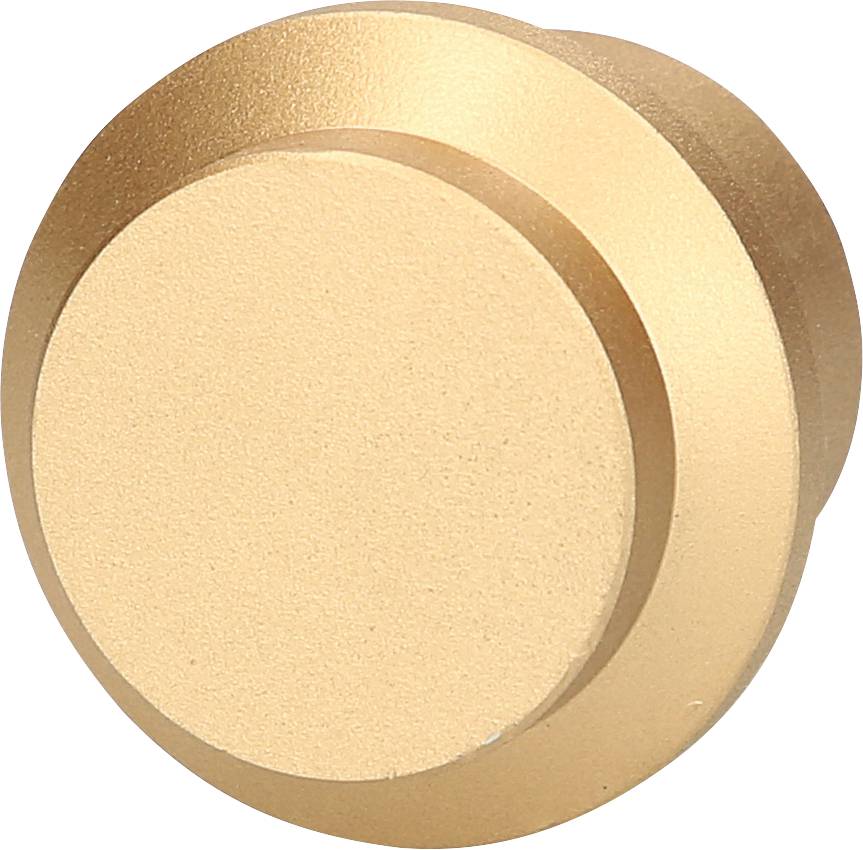 Round, gold-coloured knob or dial against a white background.