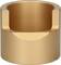 Metallic cylindrical object with a bevelled edge at the top and a smooth, gold-coloured surface.