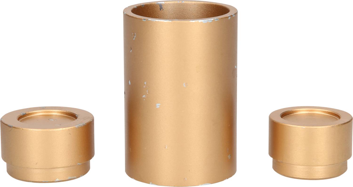 Three cylindrical, gold-coloured metal pieces: a tall cylinder in the centre and two smaller ones on the sides.