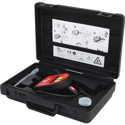 An open toolkit with an electronic device. Internal labels show safety instructions and operating guidelines.