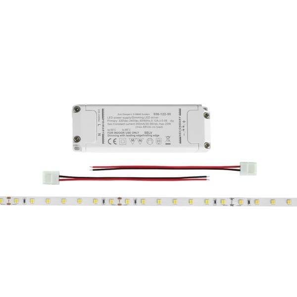 LED strip with power supply and cables, suitable for lighting projects. It clearly shows the yellow LEDs on the strip.