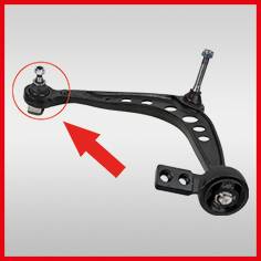 Black car suspension control arm part on a grey background with a red border. A large red arrow points to the ball joint of the part.