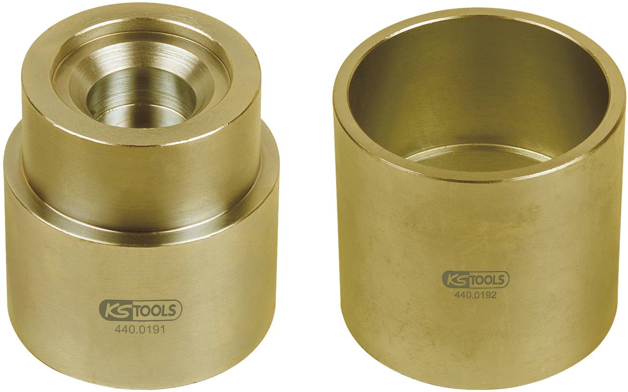 Two cylindrical brass tools by KS Tools with reference numbers 440.0191 and 440.0192, each with an open top.