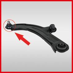 A black wishbone suspension arm with a ball joint, highlighted by a red arrow, against a grey background.