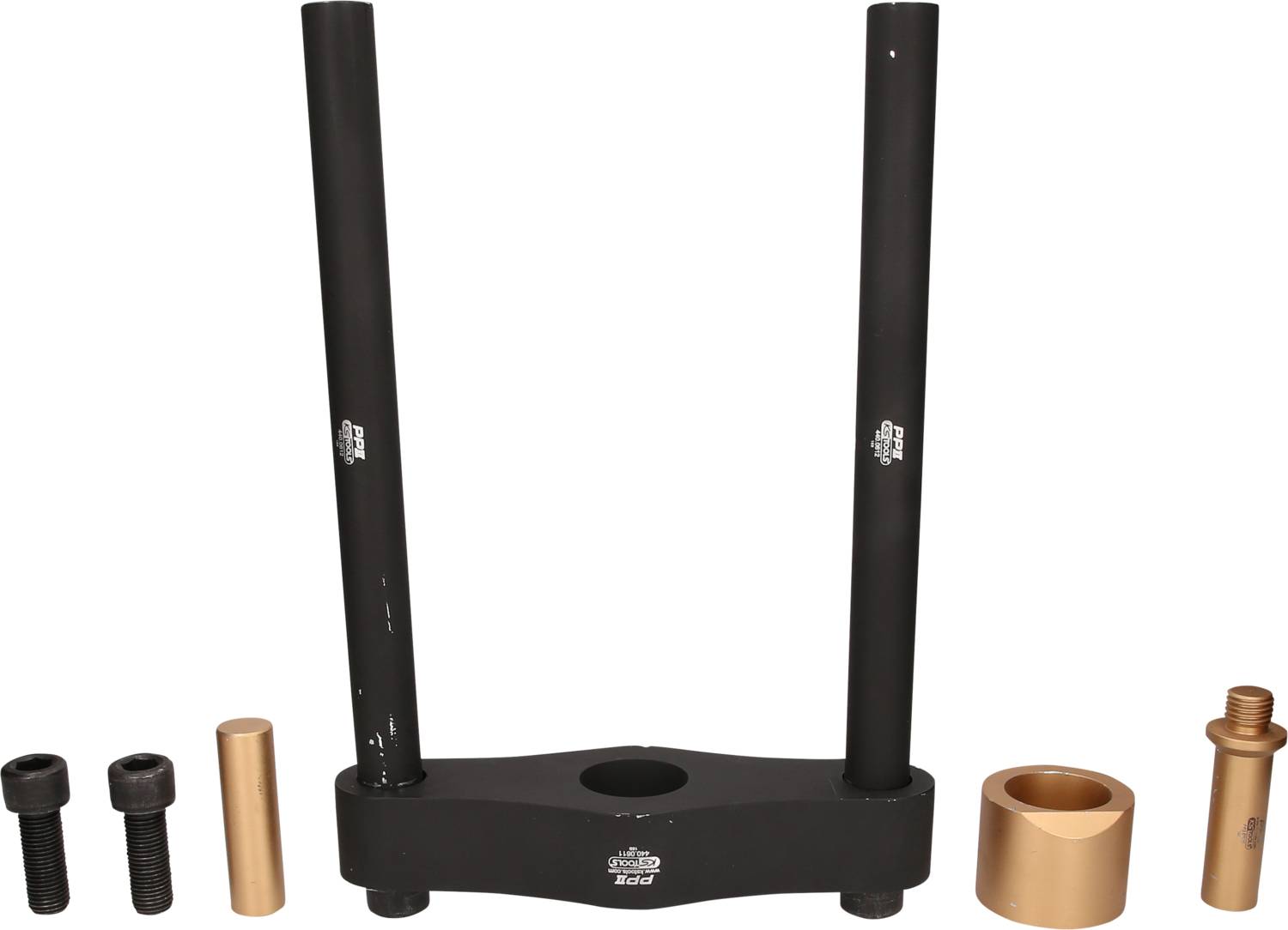 The image shows a wheel bearing puller set with various metal components used for removing wheel bearings from vehicles.