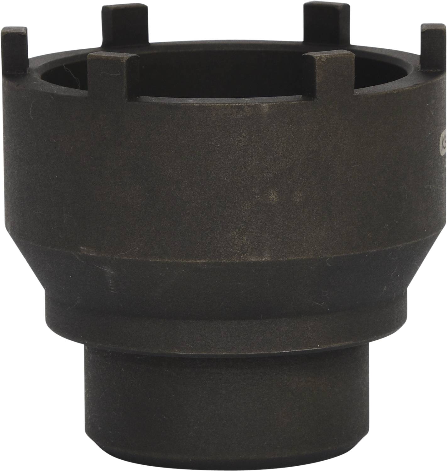 A black, cylindrical metal component with several pins at the upper edge, used for mechanical applications or repairs.
