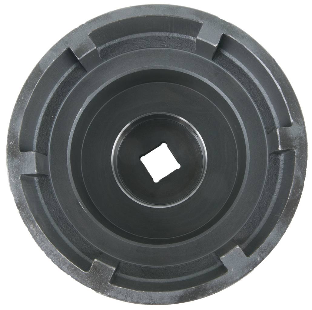 Black round object, resembling an industrial tool component, with concentric rings and a square opening in the centre.
