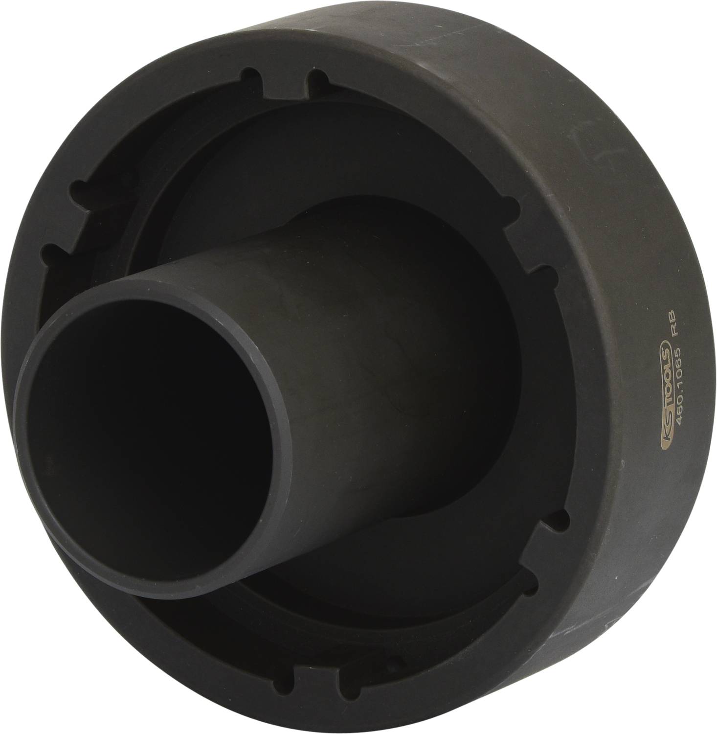 Black plastic component, cylindrical and tapering inwardly, potentially an adapter or connecting part.