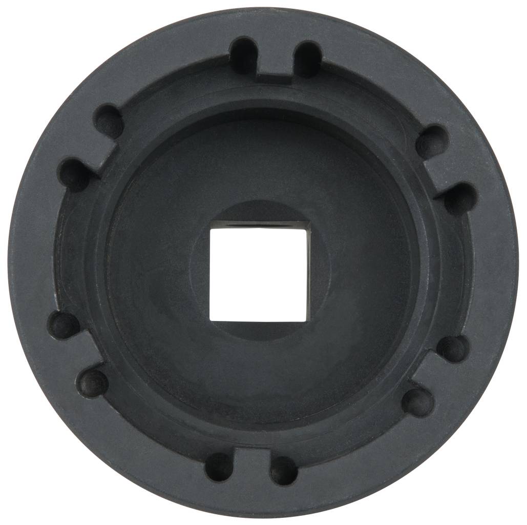 Black, round screw component with a square opening in the centre and several smaller recesses along the edge.