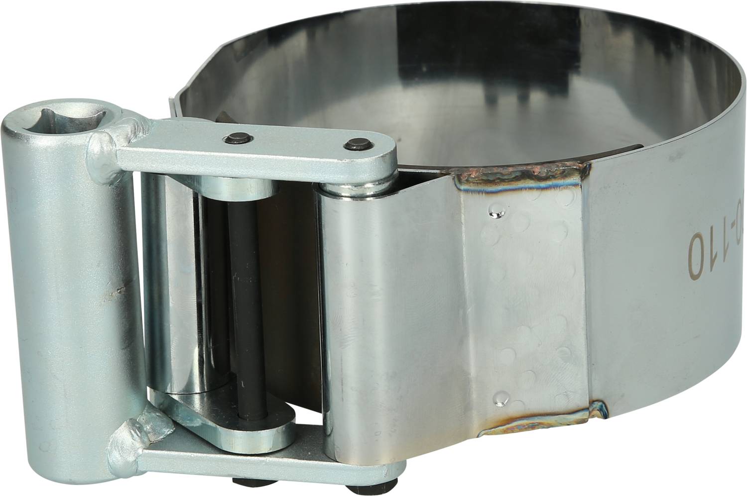 Metal fixing clamp, cylindrical in shape, with a closure mechanism, used for pipes or hoses.