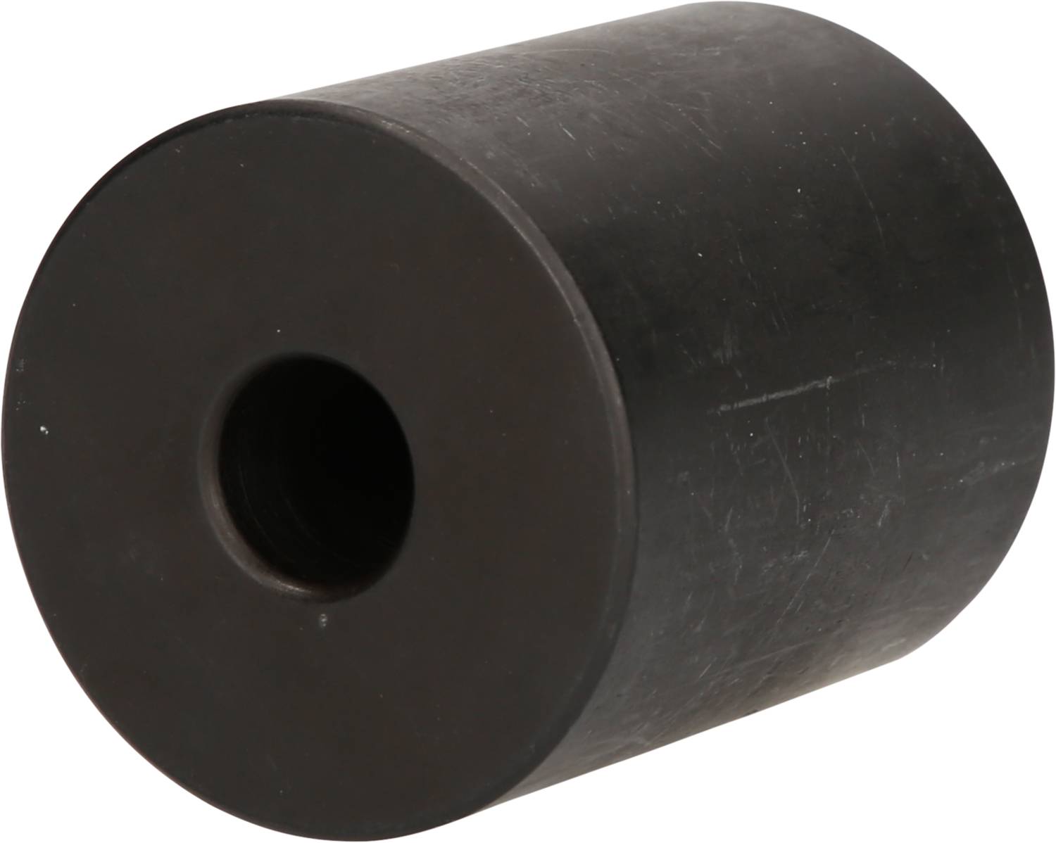 Black cylindrical rubber buffer with a central hole, used for shock absorption in mechanical applications.
