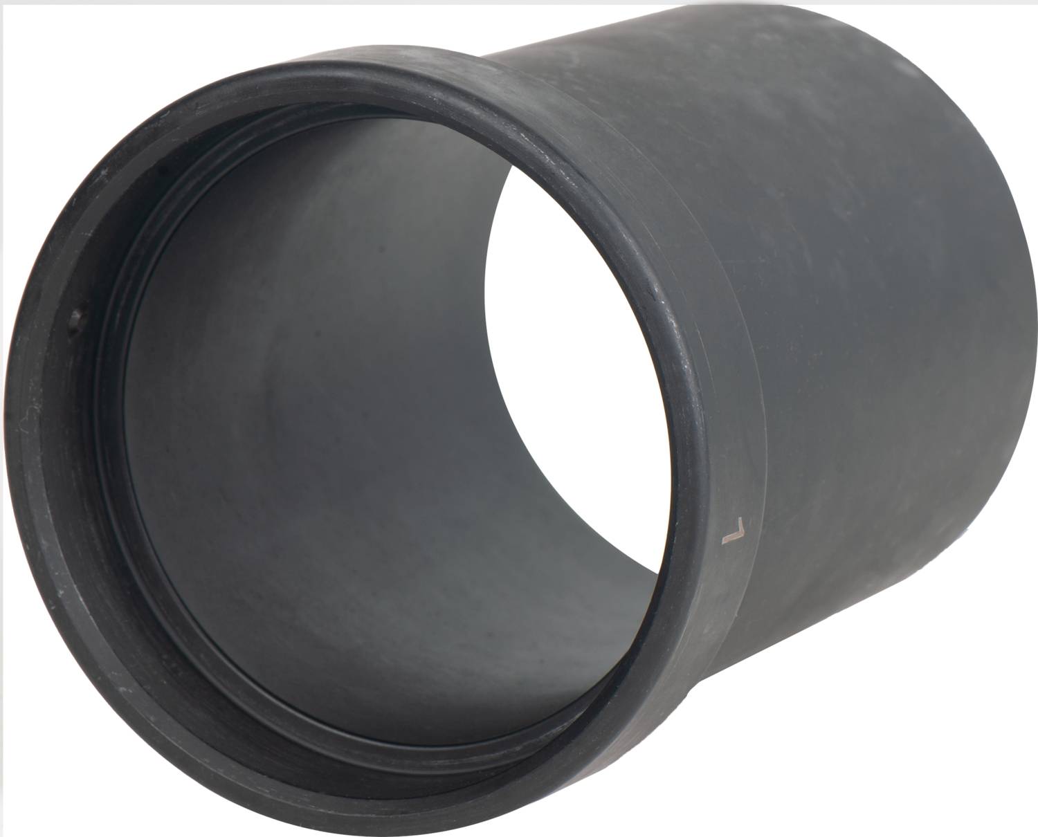A black plastic pipe lying horizontally. It has smooth surfaces and is used in building services.