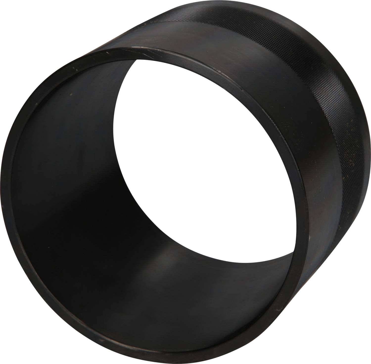 Black, semi-transparent plastic ring lying on a surface.