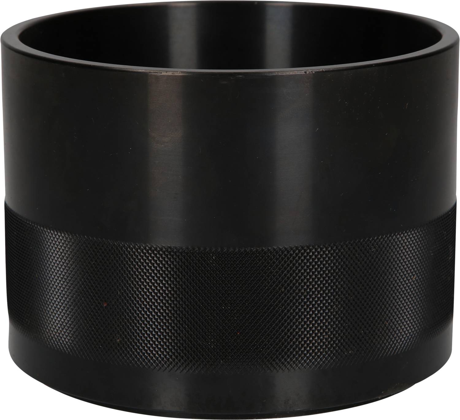 A black cylindrical container with a smooth surface and a ribbed structure around its centre.