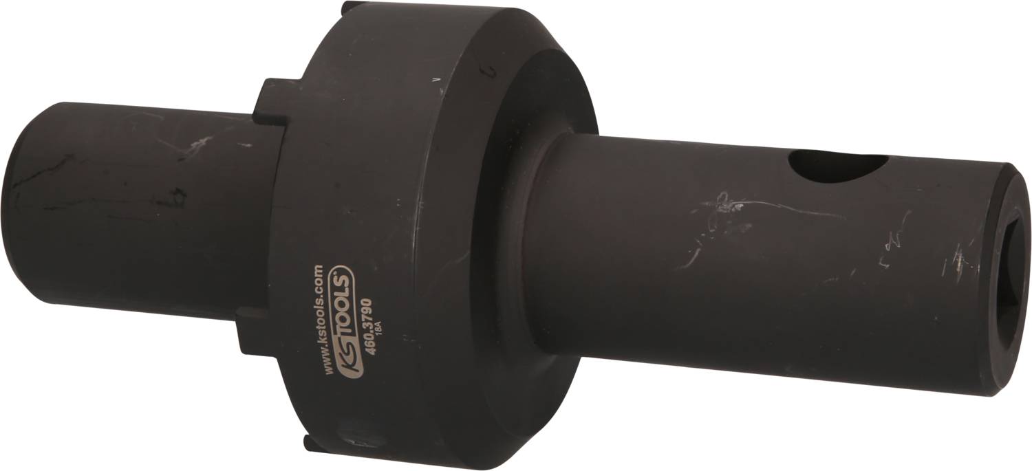 A black, cylindrical metal tool with a broad, flange-like section and a narrower end.