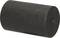 Black cylindrical object with a flat surface and rounded edge, possibly a plastic component or a roller.