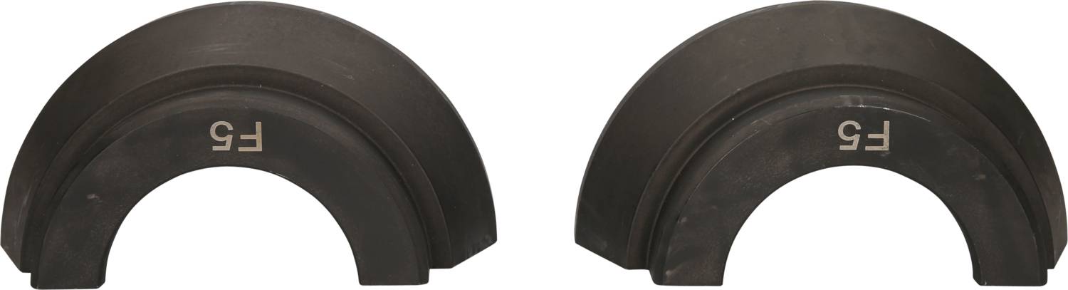 Two semi-circular, black metal parts with the inscription 'F5'. They appear to be components of a larger mechanism or tool.