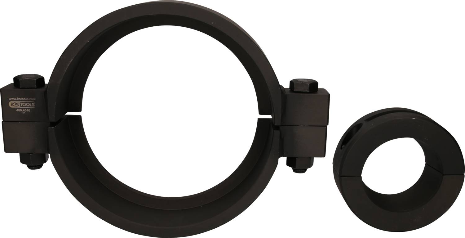 Two black steel rings, one large and one small, with side screws. They are placed on a white surface.
