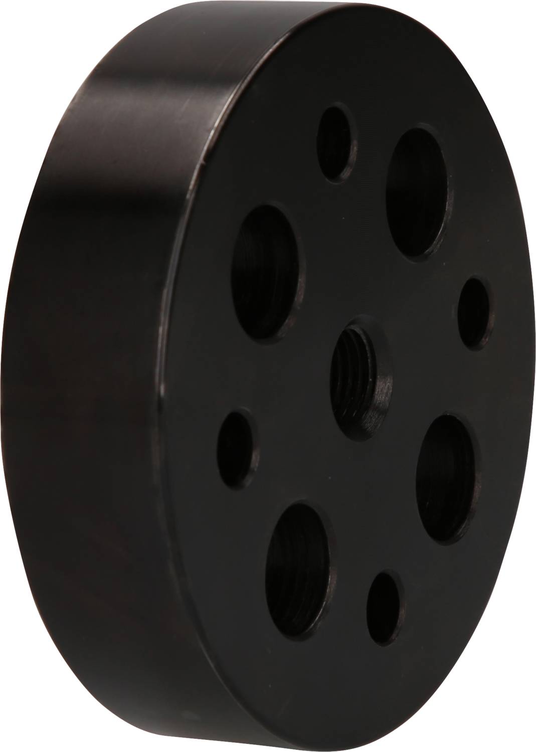 Black metal disc with multiple holes of varying sizes arranged in a pattern.