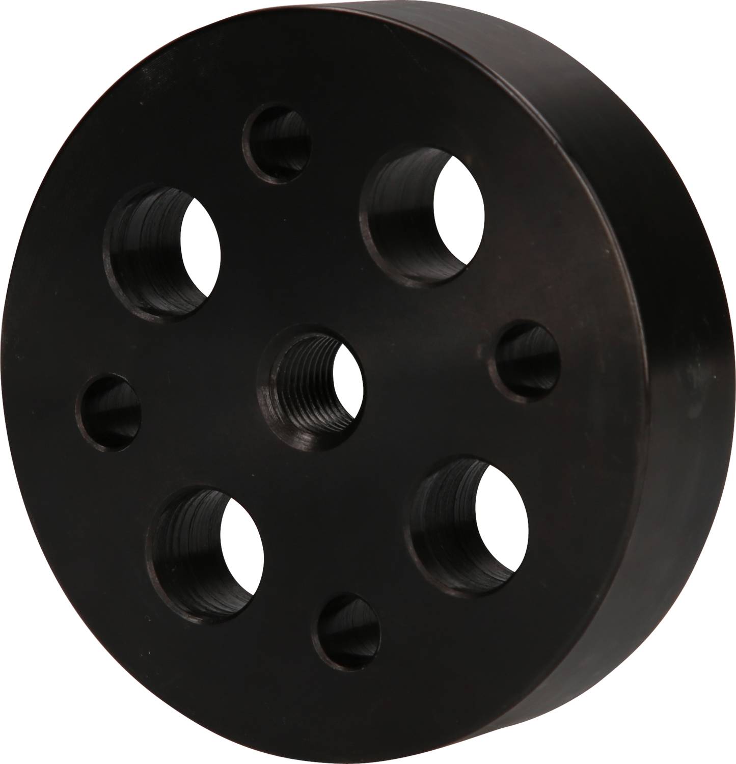 A round, black metal disc with multiple holes.