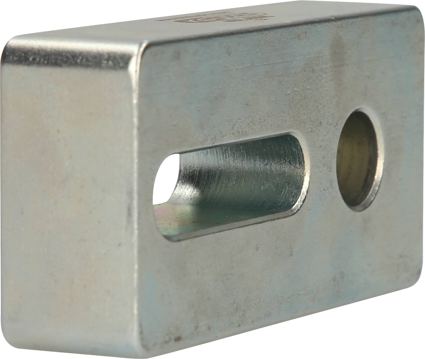 Metal block with rectangular and circular openings, silver-coloured, with no visible screws or fixings. Purpose unclear.