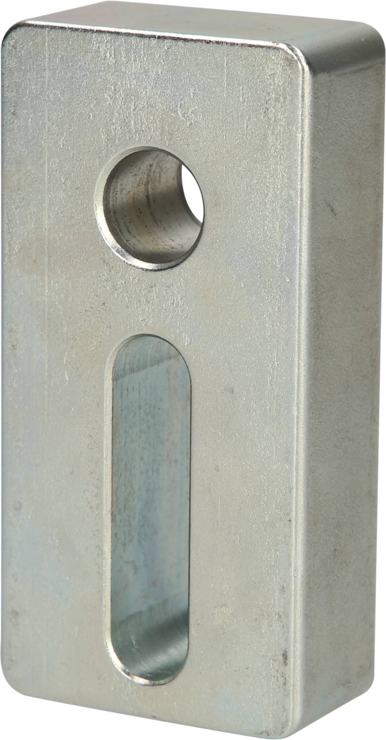 Metal block with a rectangular cross-section, round upper and elongated lower recess, possibly for mounting purposes.