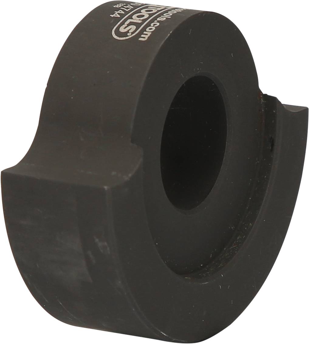 A black metal component with a circular opening in the centre and a manufacturer's name printed on it. It has a flat, curved shape.