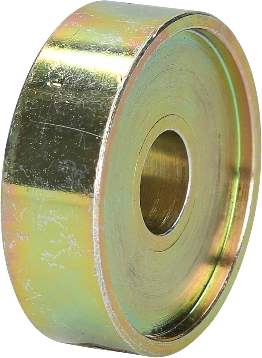 Metal disc with a central hole, partially worn and with scratch marks, golden shiny surface.