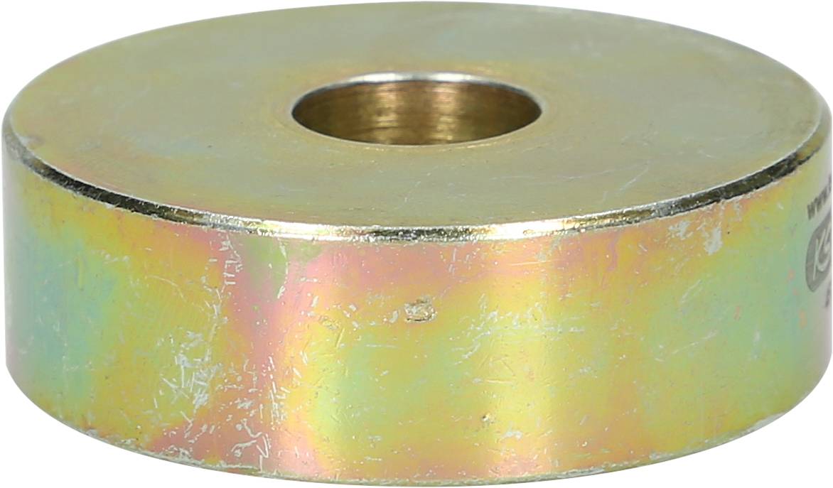 A round, flat metal disc with a hole in the centre. The surface has a shimmering, slightly iridescent gleam.