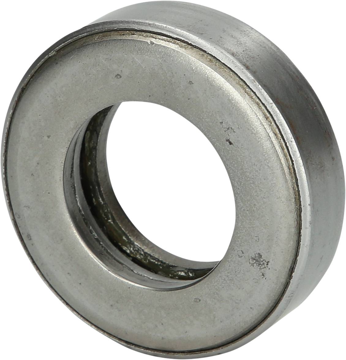 A silver metal ball bearing with a circular design and a central opening, viewed from the side.