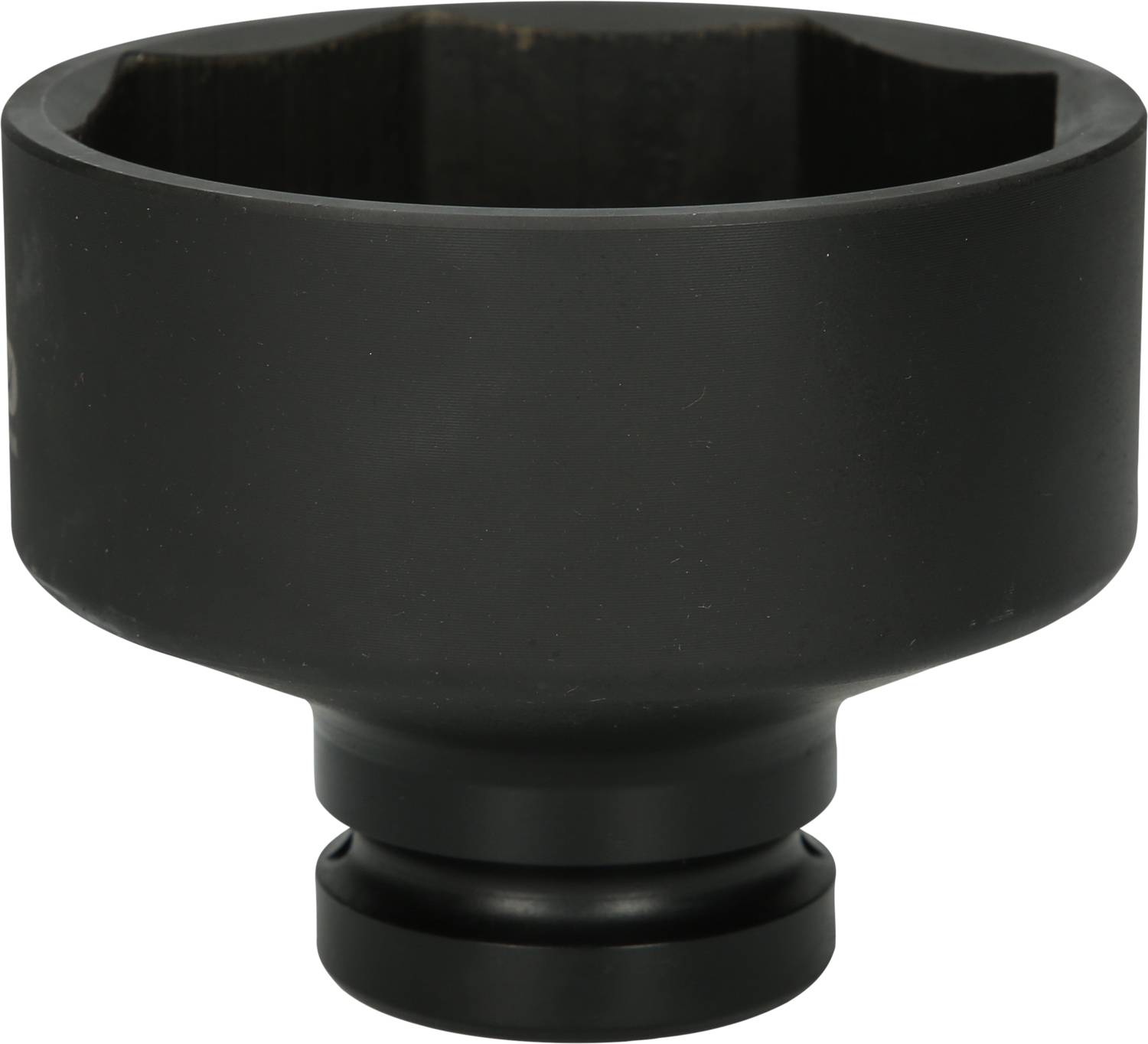 Black, cylindrical metal attachment, likely a tool component.