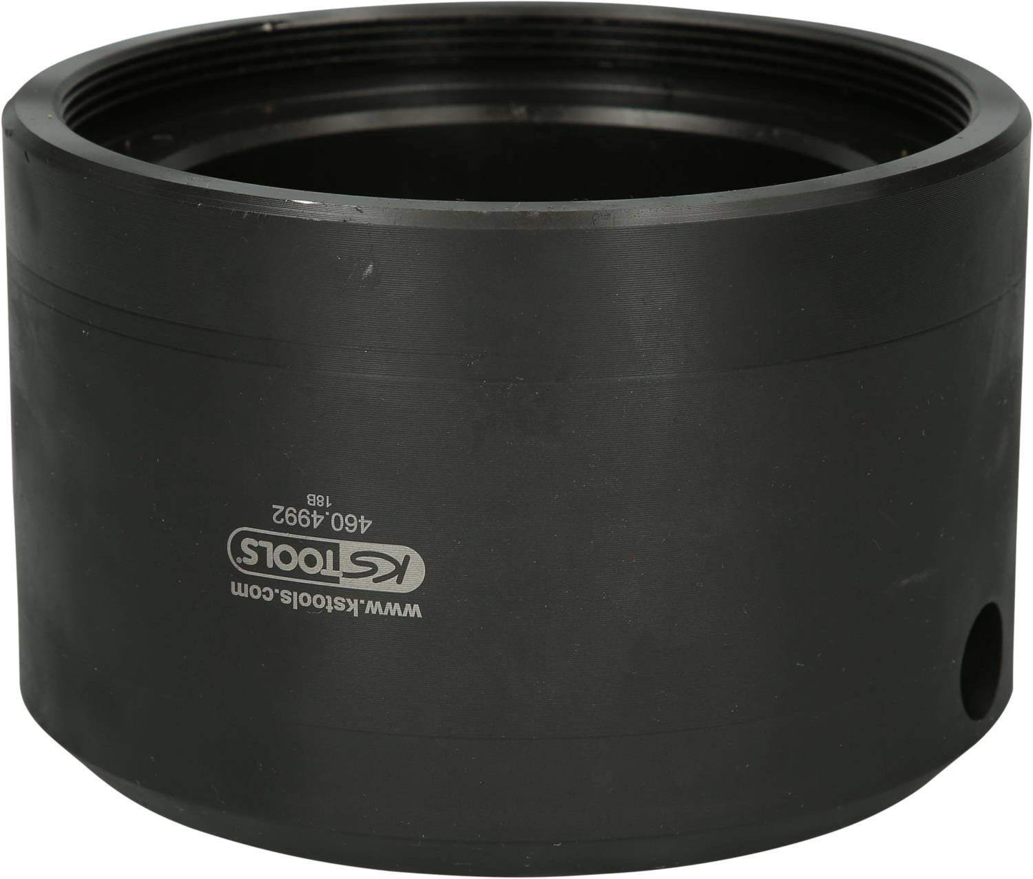 Cylindrical, black machine component with an engraving of 'KS Tools' and a serial number, likely part of a tool or apparatus.